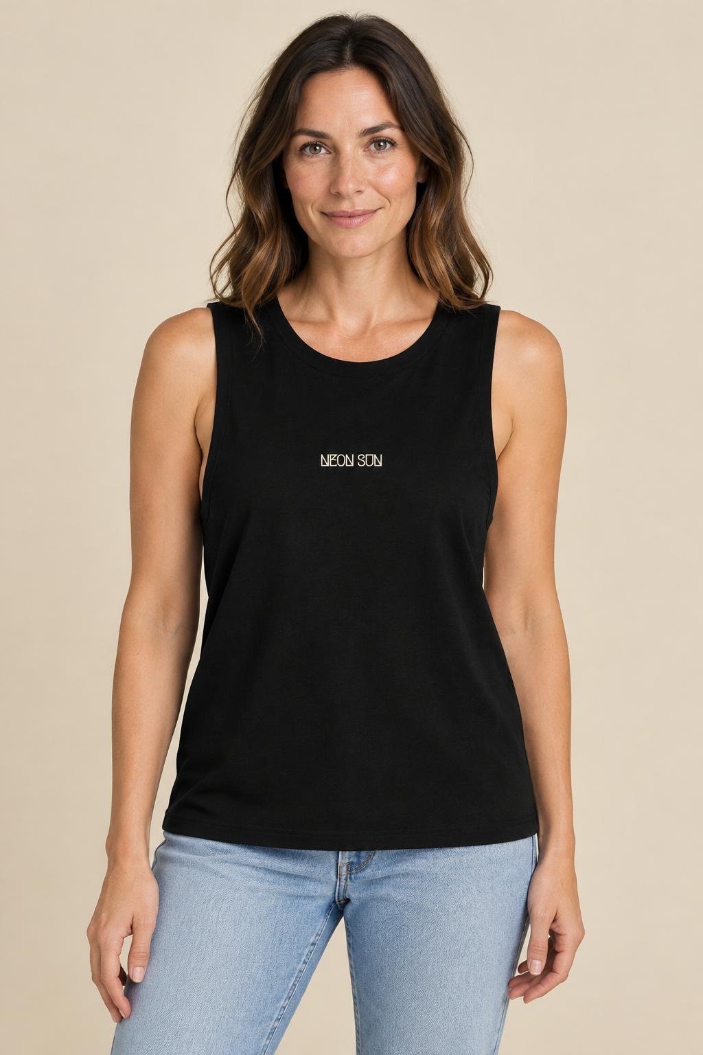 NEON SUN tank on a woman aged 30–40